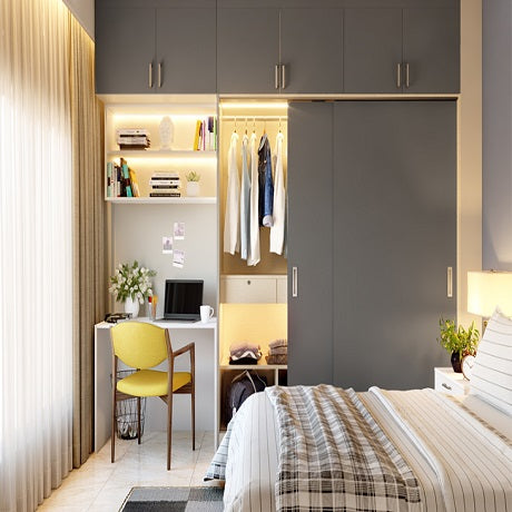 Compact bedroom with integrated wardrobe and work desk