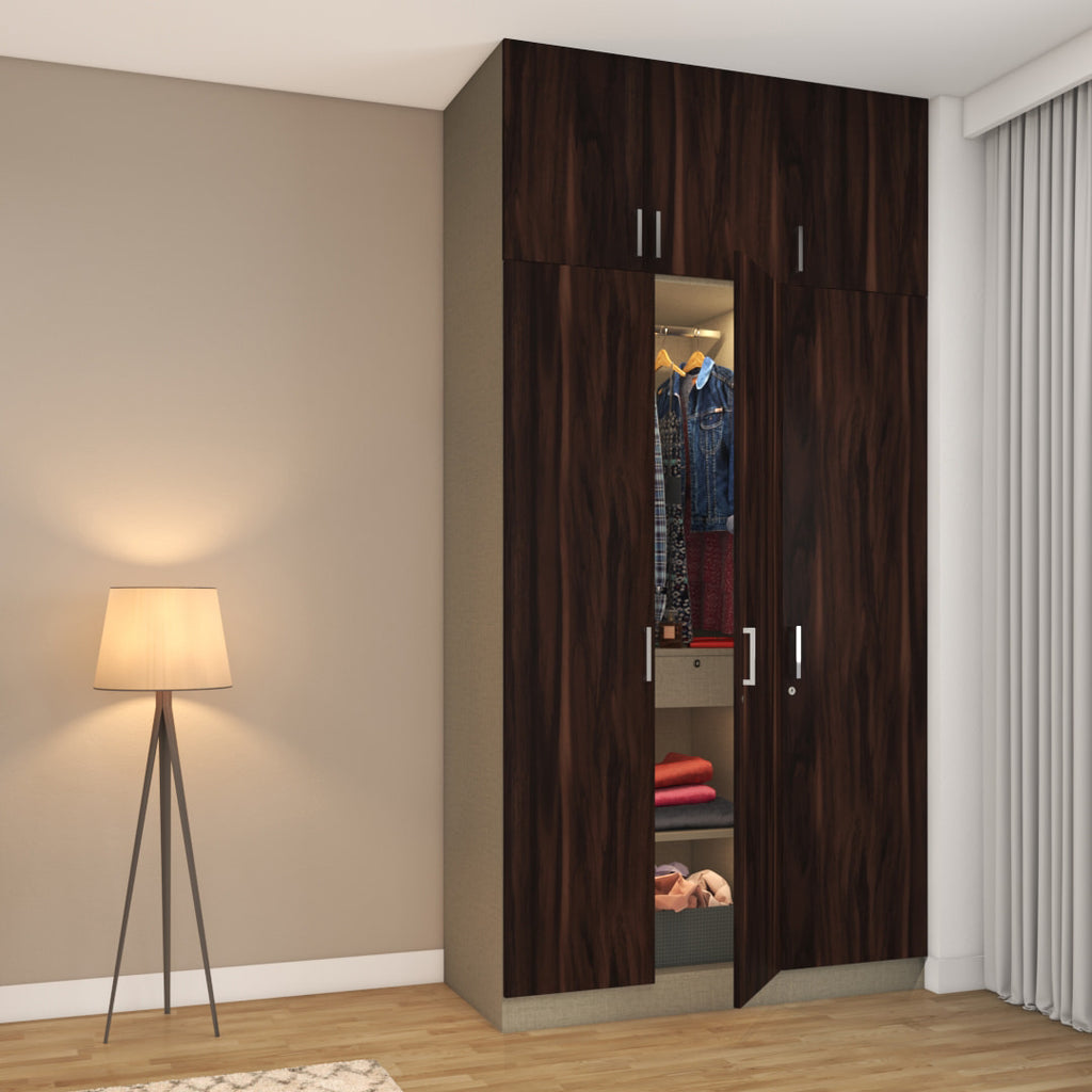 3-door wardrobe finished in dark wood laminate and equipped with a loft