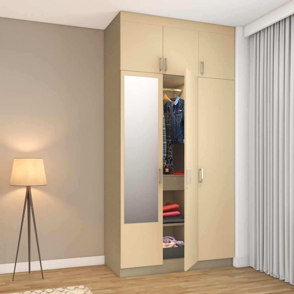 Cream coloured 3-door wardrobe with lofts