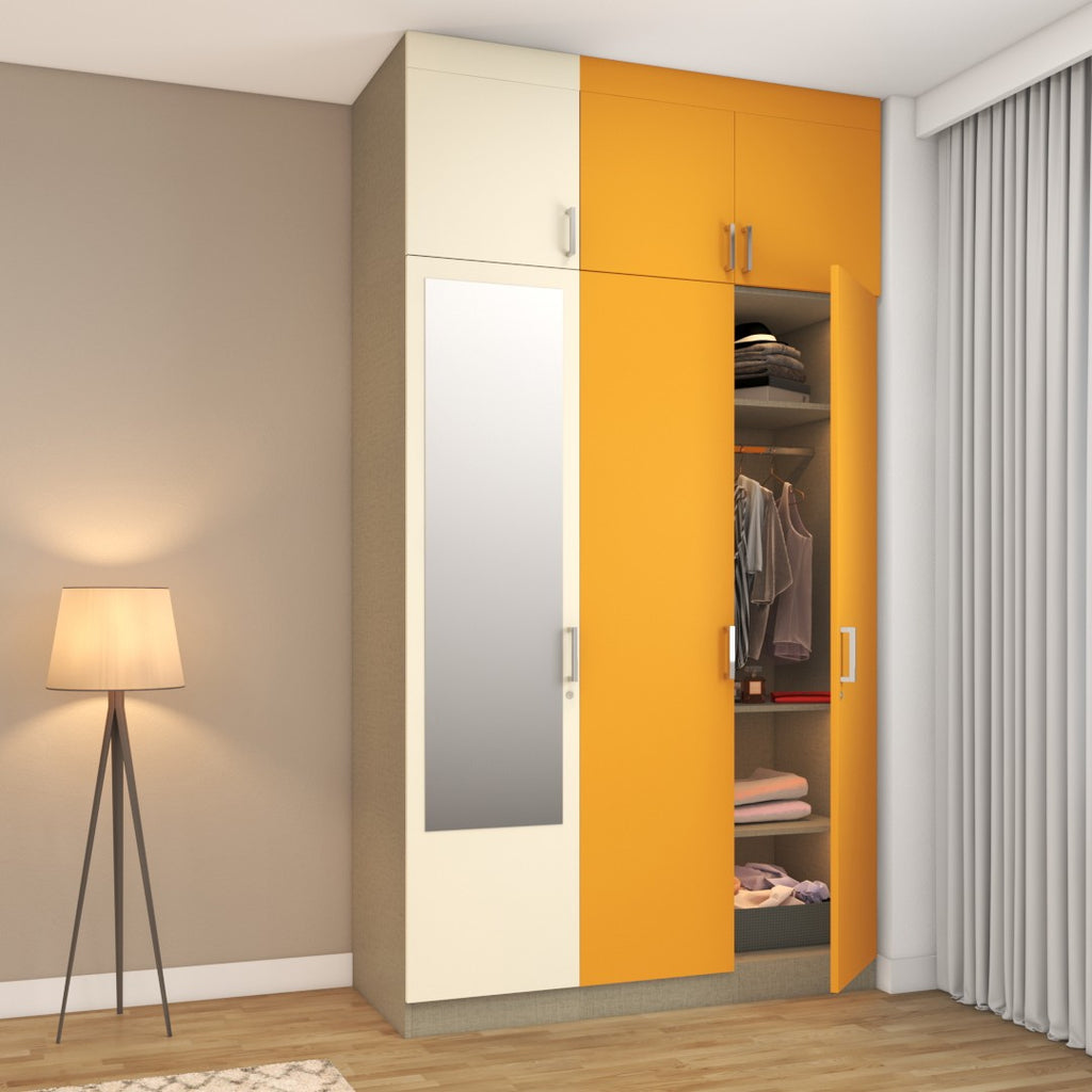 Mango yellow and frosty white 3-door wardrobe design with loft and mirror